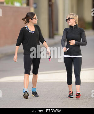 Nikki Reed and Julianne Hough share a laugh after bumping into each outside a gym, following a workout  Featuring: Nikki Reed Julianne Hough Where: Los Angeles, California, United States When: 11 Mar 2014 Stock Photo