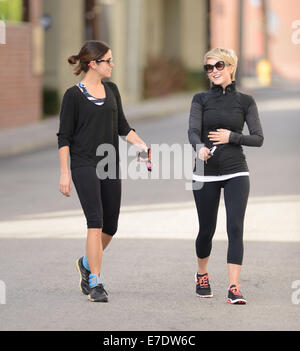 Nikki Reed and Julianne Hough share a laugh after bumping into each outside a gym, following a workout  Featuring: Nikki Reed Julianne Hough Where: Los Angeles, California, United States When: 11 Mar 2014 Stock Photo