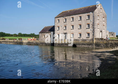 The 19c tidal mill at Carew, Pembrokeshire, Wales, UK. It was powered by tide water stored behind a dam Stock Photo