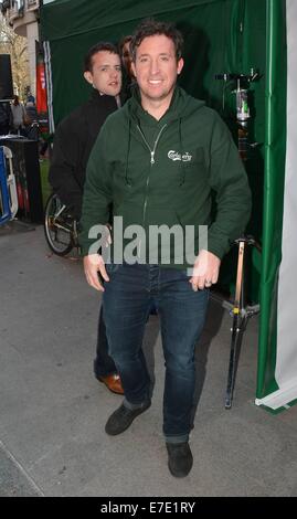 Former Liverpool FC striker Robbie Fowler spotted filming for a Carlsberg #Allthegreats promotion outside The Gaiety Theatre. Comedienne Hilary Rose was also spotted working at the filming  Featuring: Robbie Fowler Where: Dublin, Ireland When: 12 Mar 2014 Stock Photo