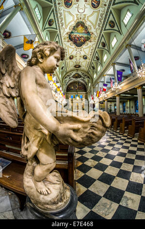 Angel Holy Water Holder at the Entrance of St. Louis Cathedral in the French Quarter New Orleans LA USA 1 Stock Photo
