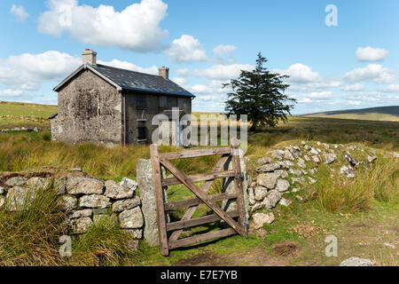 A derelict and abandoned farmhouse at Nun's Cross a remote part of Dartmoor National Park near Princetown in Devon Stock Photo