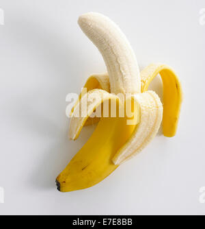 one peeled and one whole banana Stock Photo - Alamy