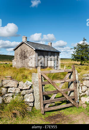 A derelict and abandoned farmhouse at Nun's Cross a remote part of Dartmoor National Park near Princetown in Devon Stock Photo