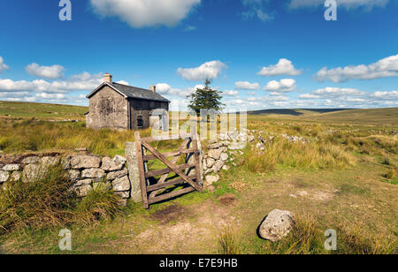 A derelict and abandoned farmhouse at Nun's Cross a remote part of Dartmoor National Park near Princetown in Devon Stock Photo