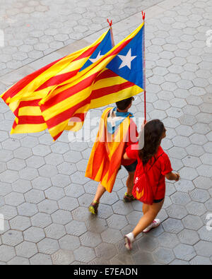 Barcelona, Spain - September 11, 2014: People call for Catalan independence on the 300th Catalan National Day in the streets of Stock Photo