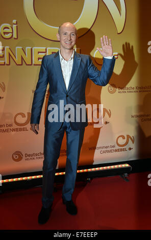 Berlin, Germany. 13th Sep, 2014. Belgian singer Helmut Lotti arrives for the charity television show 'Willkommen bei Carmen Nebel' (Welcome to Carmen Nebel), aired on German public broadcaster ZDF in Berlin, Germany, 13 September 2014. Photo: Jens Kalaene/dpa/Alamy Live News Stock Photo