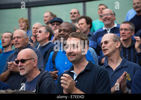 Adults choir, made from choirs from all over the region, perform at The Scoop. Totally Thames Festival, London, UK. Stock Photo