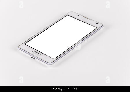 White modern smartphone with blank screen lies on the surface, isolated on white background. Selective focus Stock Photo
