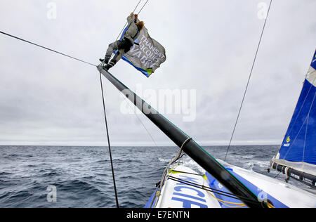 Onboard the IMOCA Open 60 Macif crewed by Francois Gabart and Michel Desjoyeaux during a training session before the Transat Jacques Vabre in the English Channel from Plymouth to Port la Foret after she won on her class the Rolex Fastnet Race. Stock Photo
