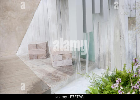 Garden - A Garden of Solitude - contemporary pergola with garden made from recycled and reused materials reclai Stock Photo