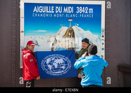 Russian climbers from the Russian Geographic Society on the Aiguille Du Midi above Chamonix, France. Stock Photo
