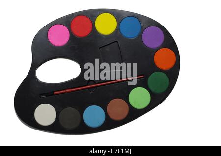 painter's palette with brushes on white background Stock Photo