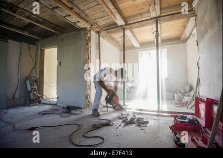 Craftsman during the substantial refurbishment of a building Stock Photo