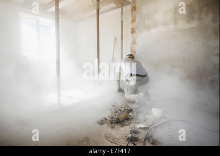 Craftsman during the substantial refurbishment of a building Stock Photo