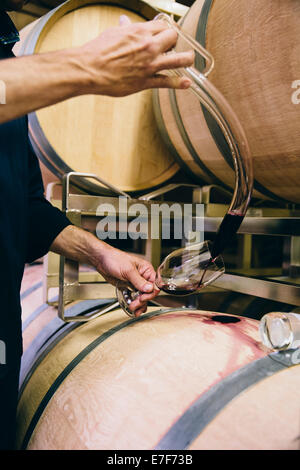 Caucasian man tasting wine Stock Photo