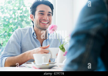 Couple eating breakfast together Stock Photo
