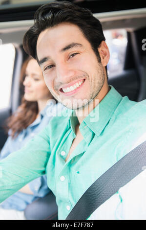 Man smiling in car Stock Photo