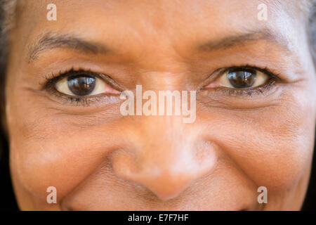 Close up of mixed race woman smiling Stock Photo