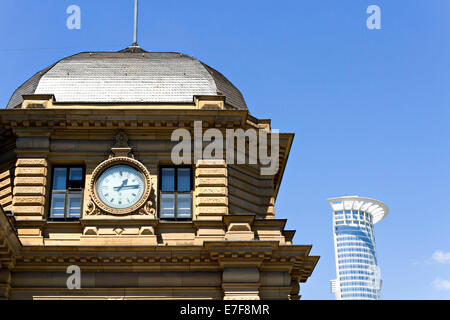 Clock in old building with the modern Westend Tower, Frankfurt am Main, Hesse, Germany, Europe. Stock Photo
