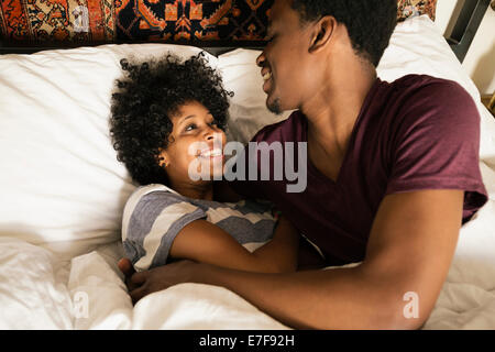 Couple playing in bed Stock Photo