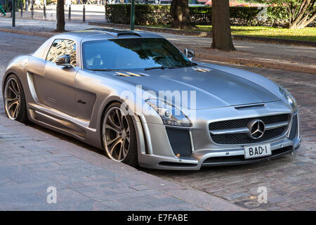 HELSINKI, FINLAND - SEPTEMBER 13, 2014: Silver metallic Mercedes-Benz SLS roadster tuned by FAB Design stands parked on a street Stock Photo
