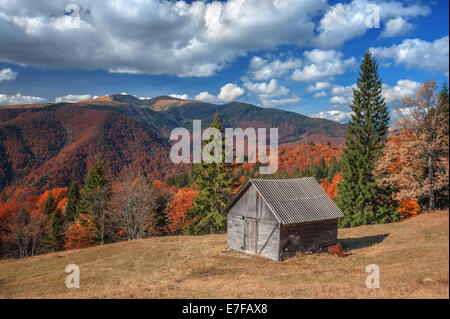 alone house in autumn mountain Stock Photo