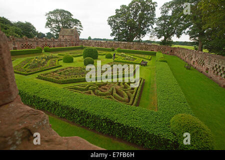 Elegant formal walled garden with low yew hedges in intricate geometric designs at historic Edzell castle in Scotland Stock Photo