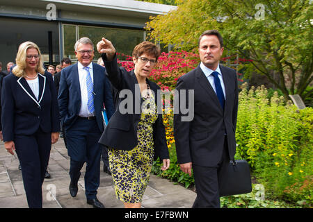 Saarbruecken, Germany. 16th Sep, 2014. Premier of the Saarland Annegret Kramp-Karrenbauer (2-R) and Prime Minister of Luxembourg Xavier Bettel are pictured at the State Chancellery in Saarbruecken, Germany, 16 September 2014. Behind them: Saarland Vice Minister-president of the Saarland and Minister for the Economy, Employment, Energy, and Transport Anke Rehlinger and Luxembourt Minister for Labour and Employment Nicolas Schmit. The governments of Luxembourg and the Saarland held a joint cabinet meeting. Photo: OLIVER DIETZE/DPA/Alamy Live News Stock Photo