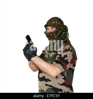 Man in camouflage with handgun. Isolated on white background Stock Photo