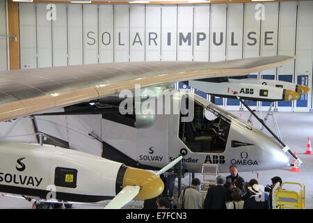 (140916) -- GENEVA, Sept. 16, 2014 (Xinhua) -- Photo taken on Sept. 9, 2014, show the Solar Impulse 2 at its home base in Payerne, Switzerland. A new upgraded Swiss-made solar aircraft is poised to take the first round-the-world solar flight, without any fuel, in 2015. The global flight is scheduled to start in March 2015 form the Gulf area. The single-seat aircraft will fly, in order, over the Arabian Sea, India, Burma, China, the Pacific Ocean, the United States, the Atlantic Ocean and Southern Europe or North Africa before closing the loop by returning to the departure point. (Xinhua/Zhang  Stock Photo