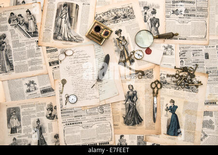 antique office accessories, writing tools, vintage fashion magazine for the woman from 1898. retro style toned picture Stock Photo