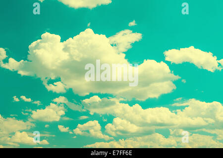 turqiuse blue cloudy sky background. vintage style toned picture Stock Photo