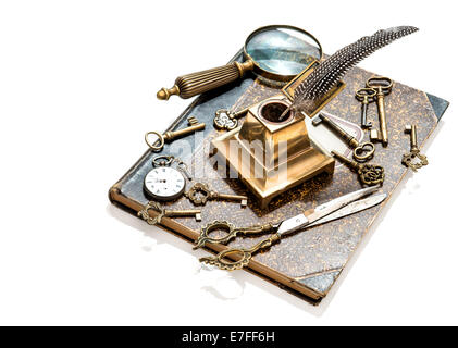 antique keys, pocket watch, ink pen, loupe, book isolated on white background. collectibles and vintage Stock Photo