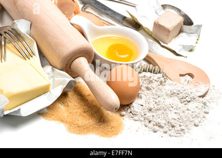 baking ingredients eggs, flour, sugar, butter, yeast. food background Stock Photo