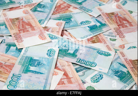 Background of one and five thousand russian roubles bills Stock Photo