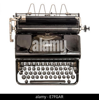 Old typewriter isolated on white background. Antique object. Top view Stock Photo