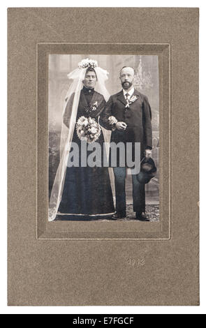 BERLIN, GERMANY - CIRCA 1912: antique wedding photo. portrait of just married couple. nostalgic picture with original scratches Stock Photo