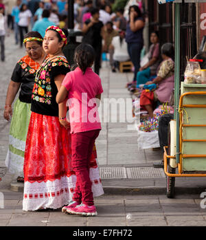 Young girl wearing traditional clothes in Oaxaca, Mexico Stock Photo