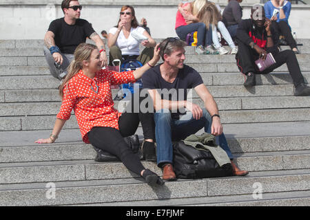 London UK. 16th September 2014.  Londoners enjoy the warm weather in Trafalgar Square  Credit:  amer ghazzal/Alamy Live News Stock Photo