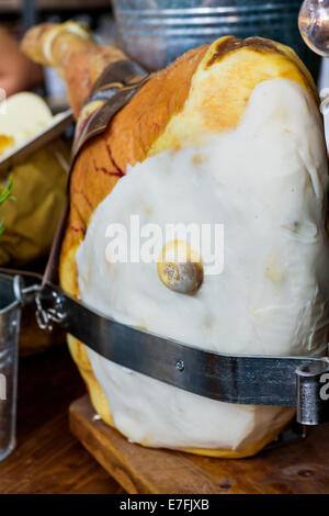 Prosciutto leg at the market Stock Photo