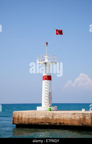 Light house in Side harbour. Stock Photo