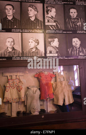 Photos and clothes of child victims on display at the Auschwitz concentration camp, Auschwitz, Poland Stock Photo