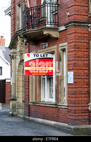Property To Let board outside a building in Lytham, Lancashire Stock Photo