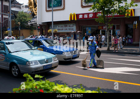 Taxis and mc Donalds restaurant in Shanghai. McDonald's Corporation is facing a shortage of products in some outlets across nort Stock Photo