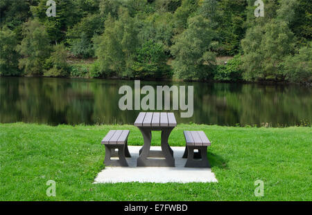 picnic table in countryside setting Stock Photo