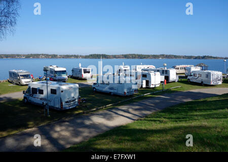 Recreational vehicle lines up in Örnäs Camping Site, Åmål, Sweden Stock Photo