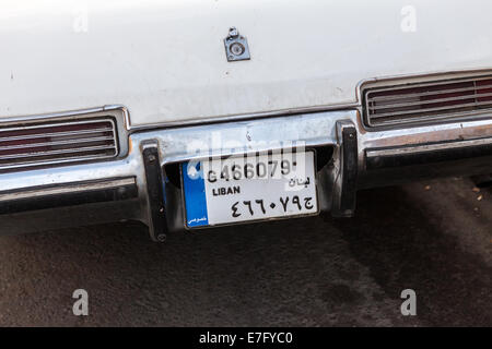 A classic white car with a Lebanese license plate, in Beirut Central District (Downtown), Lebanon. Stock Photo