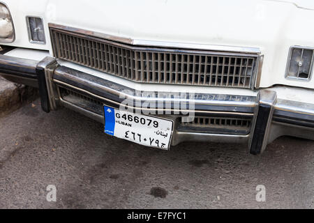 A classic white car with a Lebanese license plate, in Beirut Central District (Downtown), Lebanon. Stock Photo