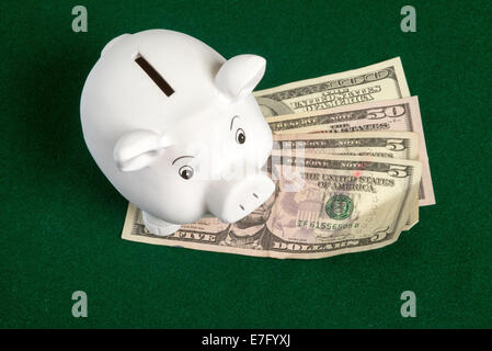White piggy bank and US Dollars Stock Photo